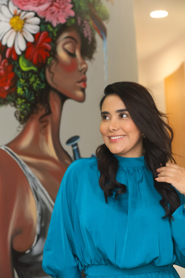 Esthetics studio owner portrait at a Costa Rica salon, natural window light