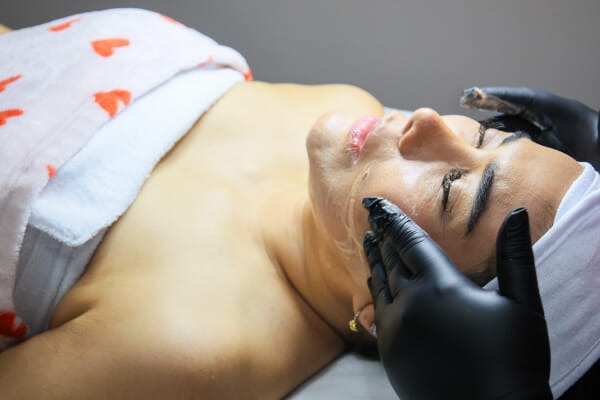 Facial treatment result at NOBU Escazú, a Costa Rica esthetics salon, before-and-after documentation