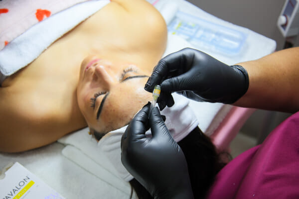 Injectable skincare product detail at NOBU Escazú, a Costa Rica esthetics salon, clean studio lighting